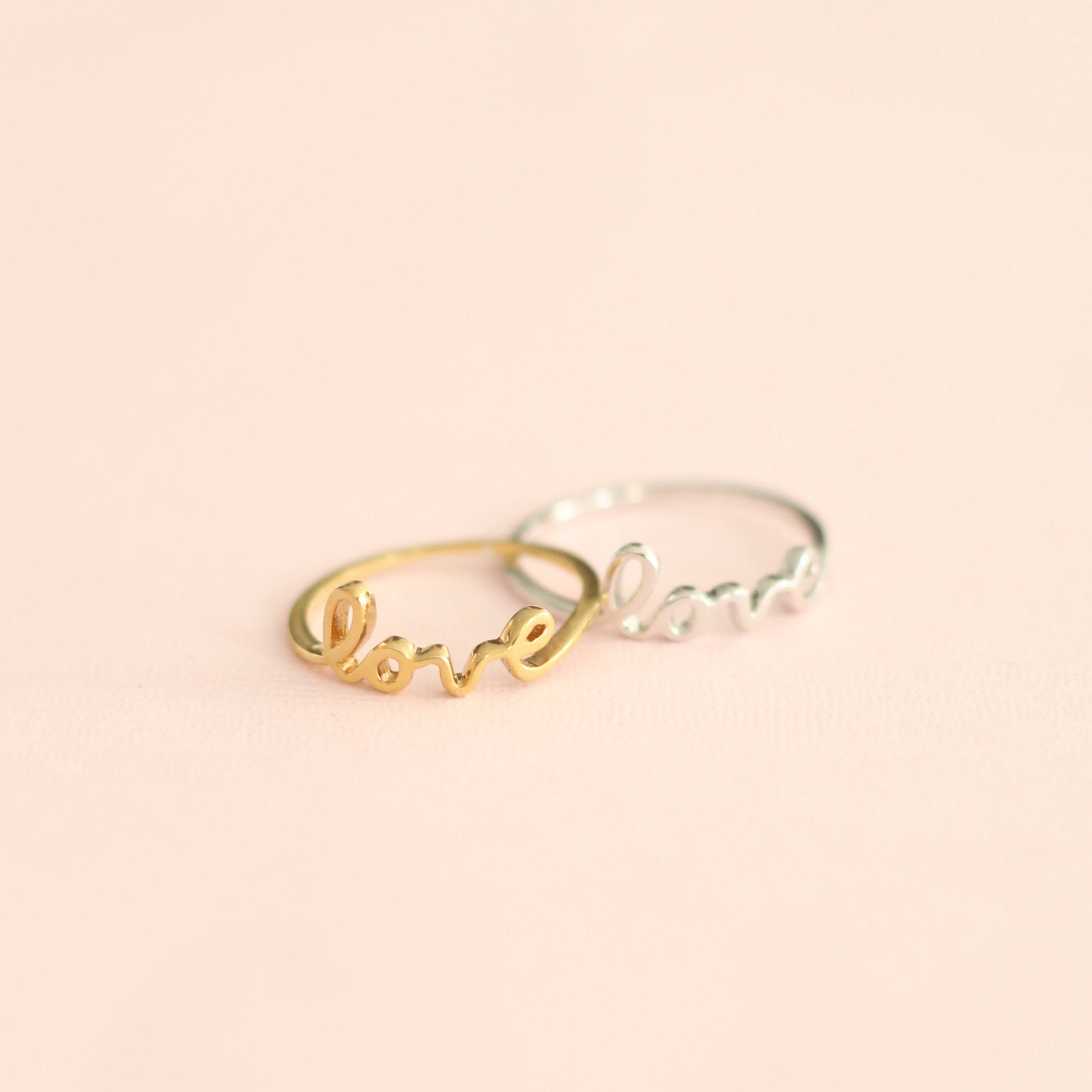 sterling silver and gold love letter rings