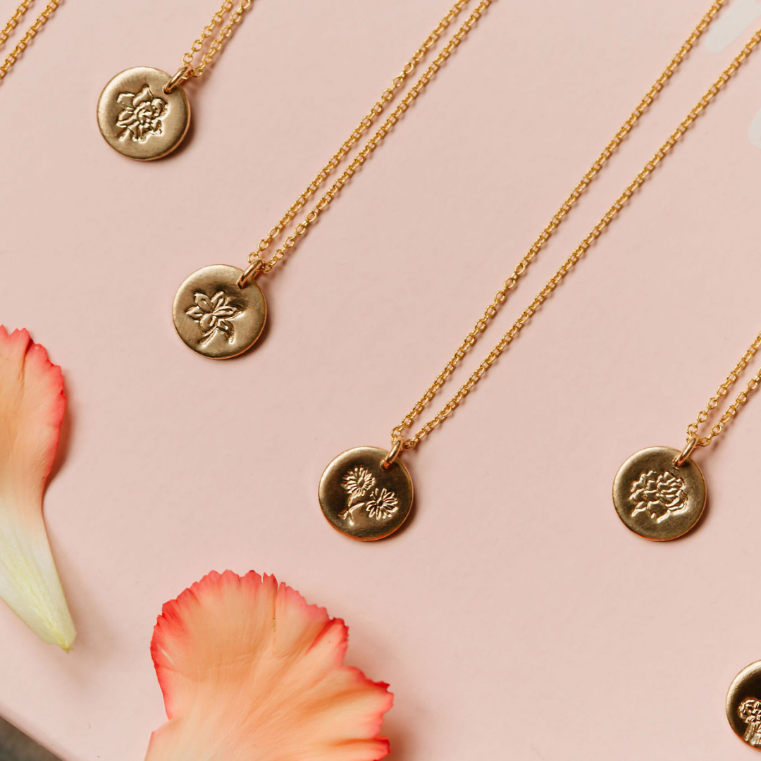 hand stamped birth flower necklaces